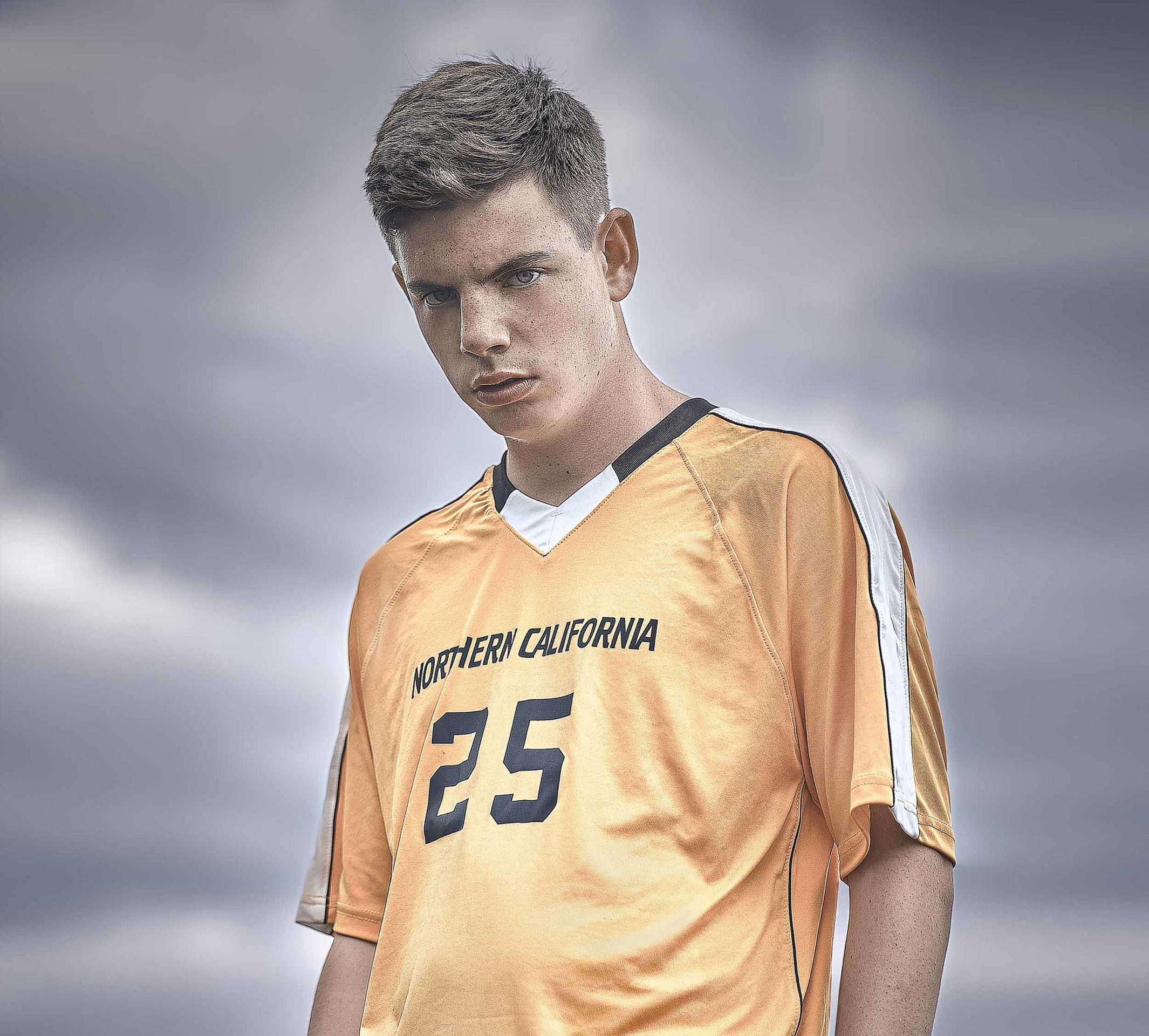 Sean, a player on the Clovis North Unified soccer team posing for the camera.