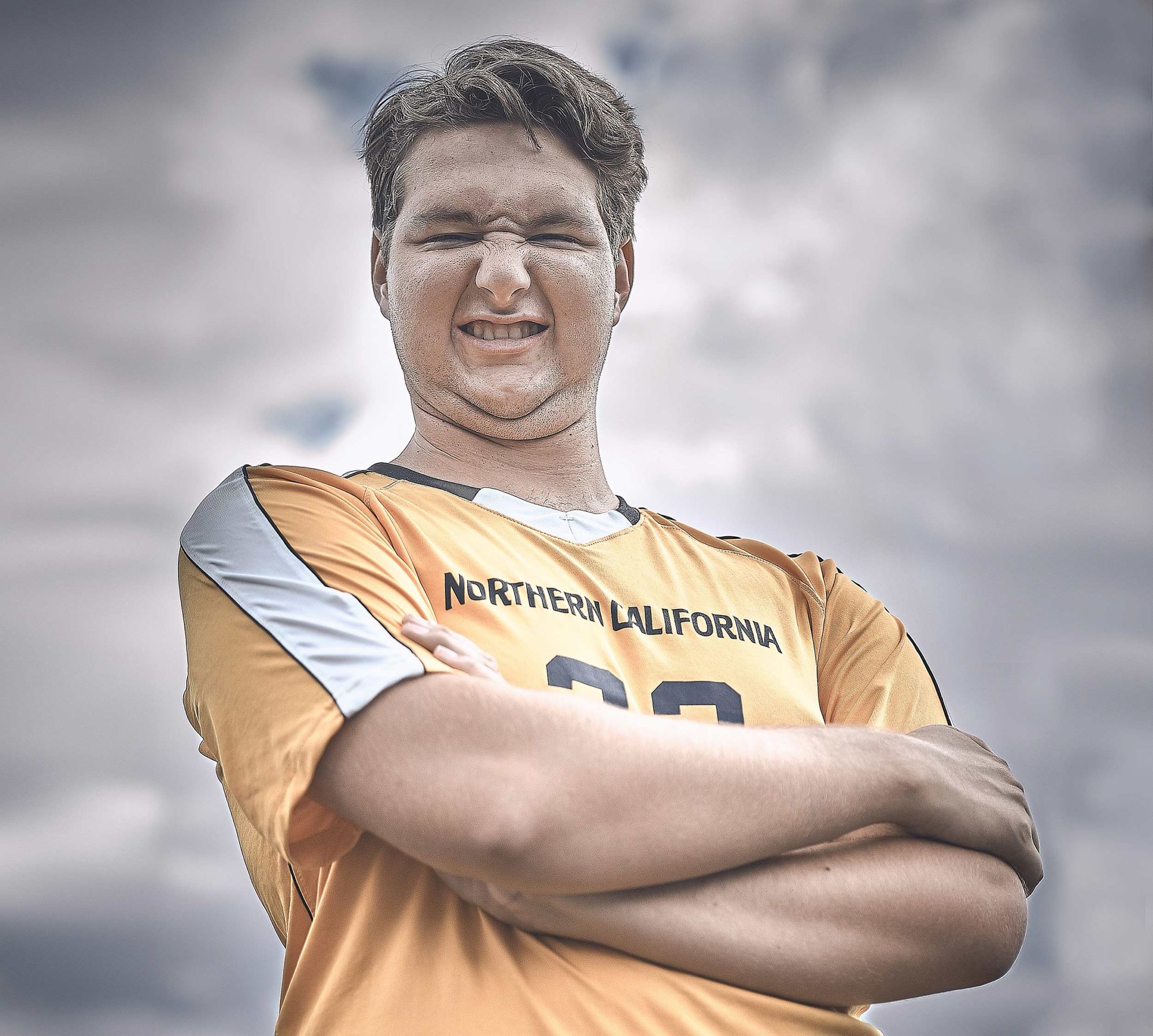 Cody,a player on the Clovis North Unified soccer team posing for the camera.