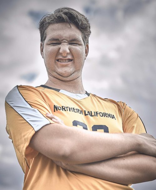 Cody,a player on the Clovis North Unified soccer team posing for the camera.