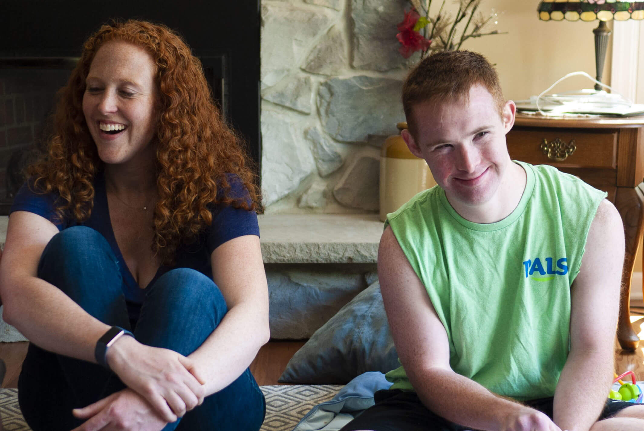 Jenni and Jason smiling at the camera.