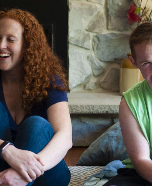 Jenni and Jason smiling at the camera.