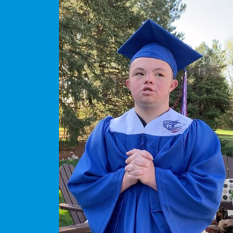 Image of student in cap and gown for graduation.