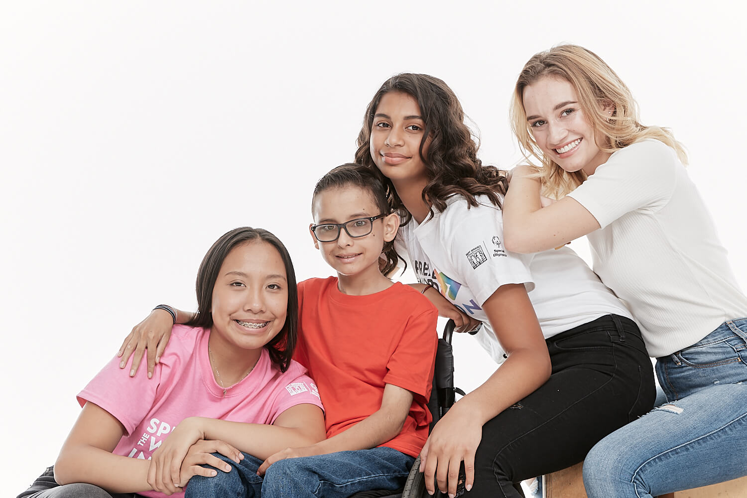 Athletes posing during a Spread the Word photo shoot.
