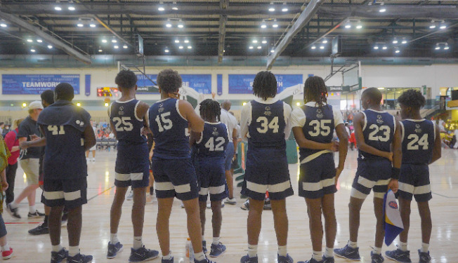 Members of the BGCA Mississippi Delta Unified basketball team waiting to take the court.